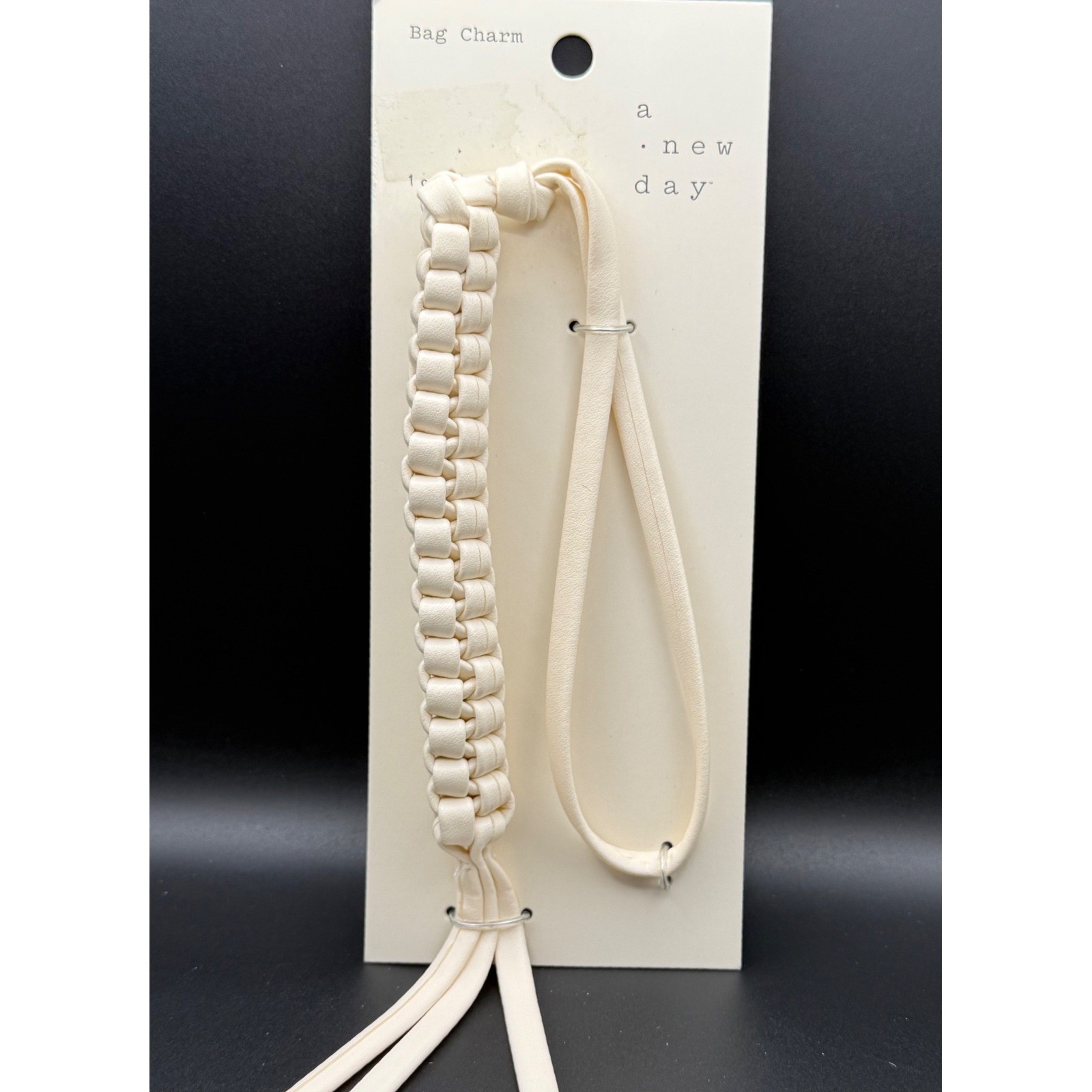 A New Day Cream Braided Faux Leather Bag Charm Tassel NWT 024 06 0564