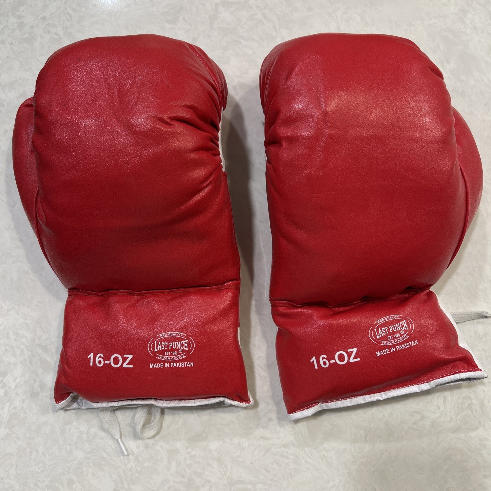 16 oz Last Punch Red Boxing Gloves designed for training and sparring.
