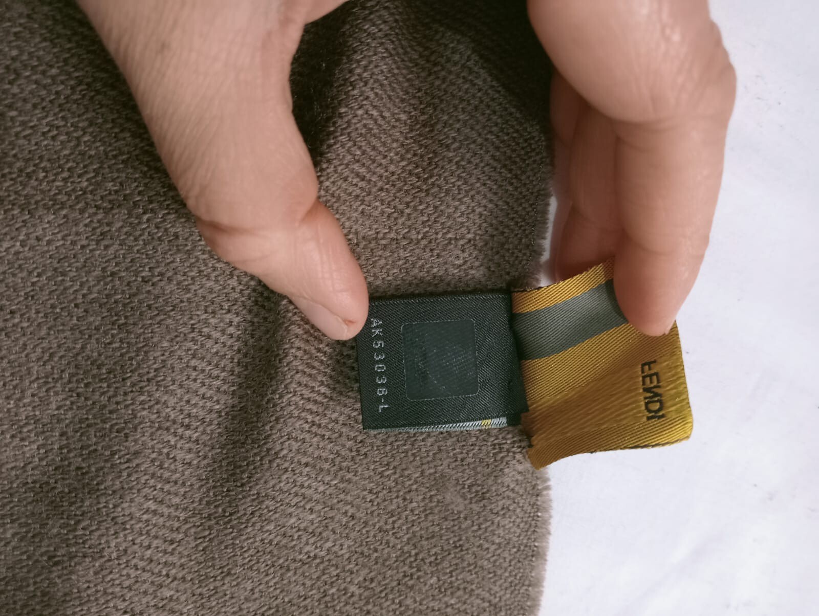 Y# FENDI Wool Men's Scarf, has threads pulled
