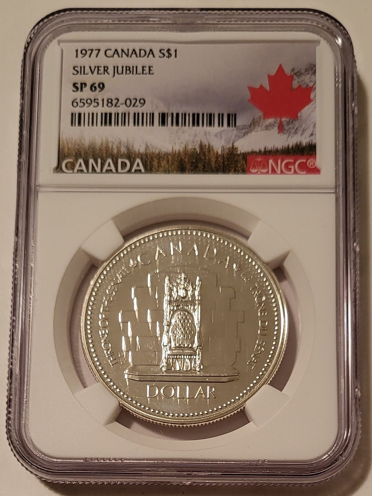 Canada 1977 Silver Dollar Jubilee SP69 NGC Maple Leaf Label