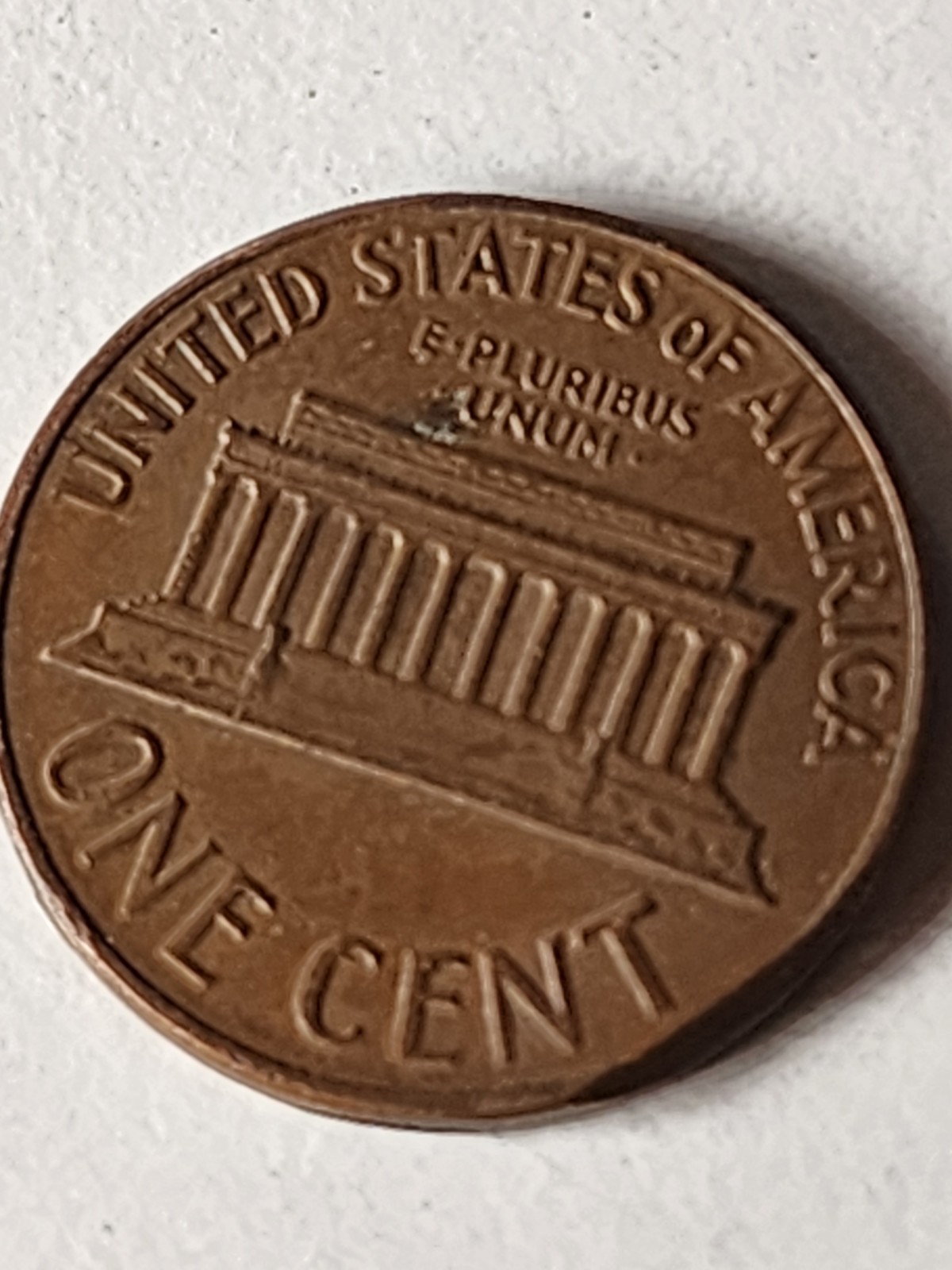 1966 penny no mint mark ”L” error On Rim
