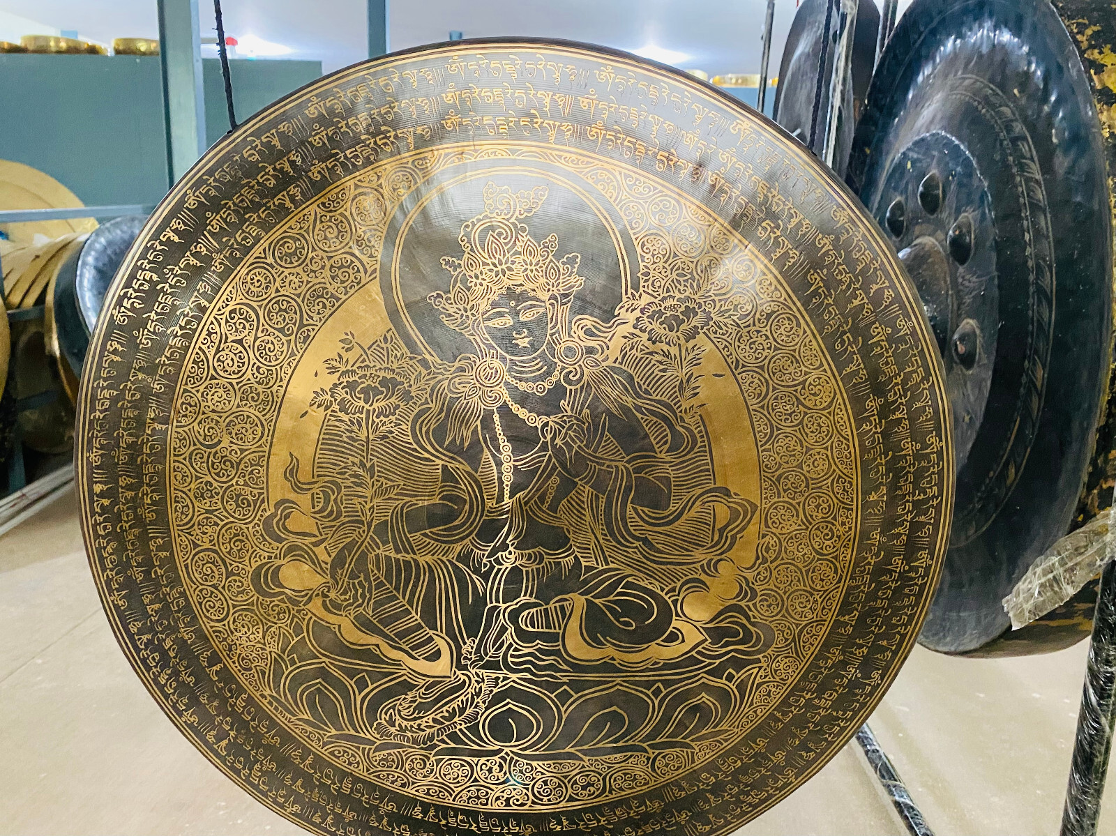 Embrace the Golden & Black attire Green tara adorned Tibetan Gong- in 6 sizes
