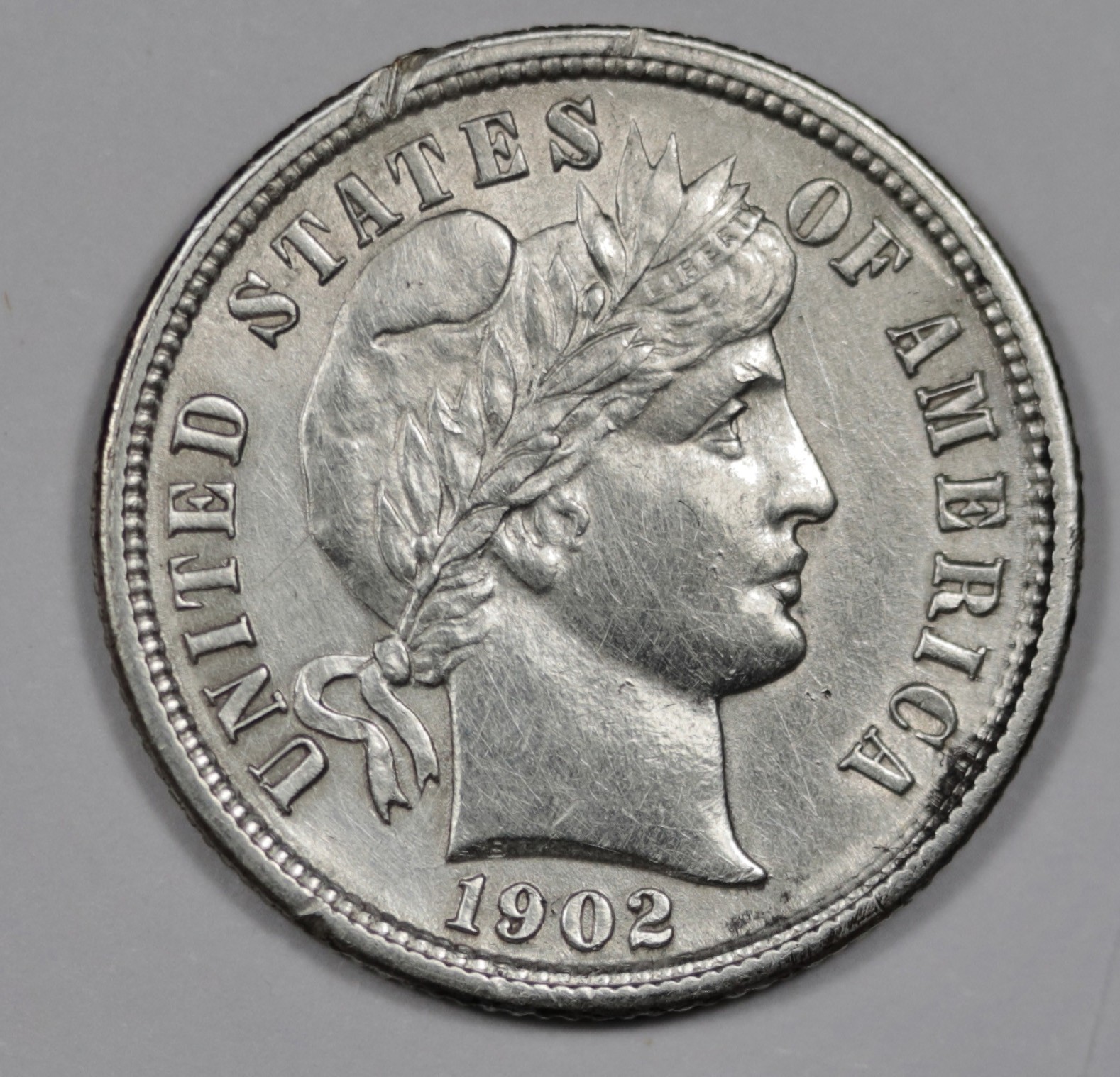 1902-s Barber Dime.  AU.  208010