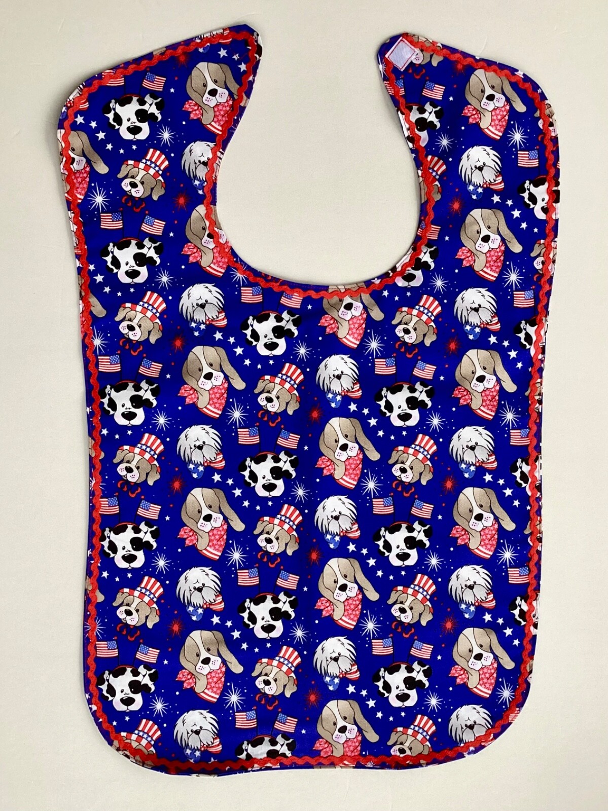 ADULT CLOTHING PROTECTOR/ BIB (PATRIOTIC DOGS)