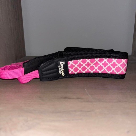 Pink and black camera strap