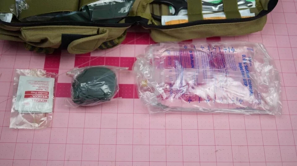North American Rescue Combat Casualty Response Kit With Med Supplies See photos