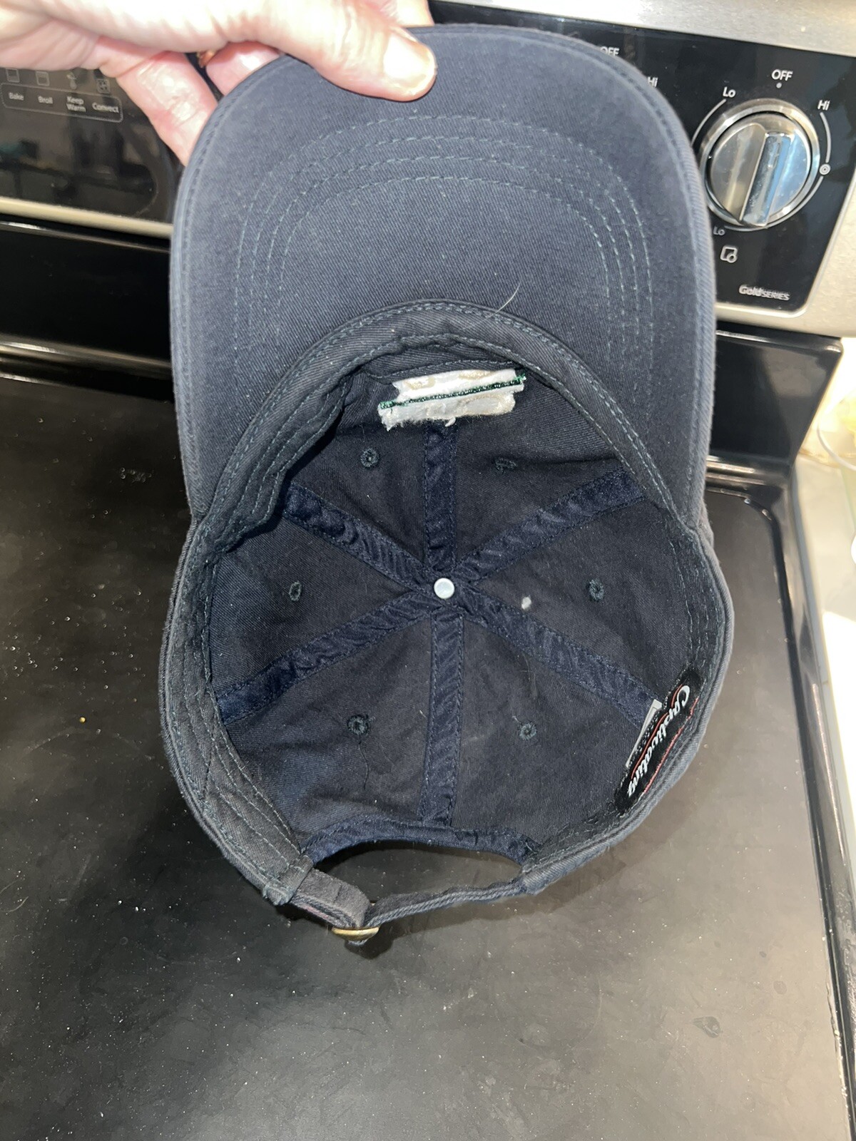 Notre Dame on billNavy blue Hat Cap with ND underlined in Green and 42 under Adj