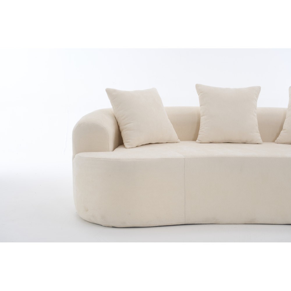 Crescent-shaped sofa, modern low-back design with deep cushions, self-inflating