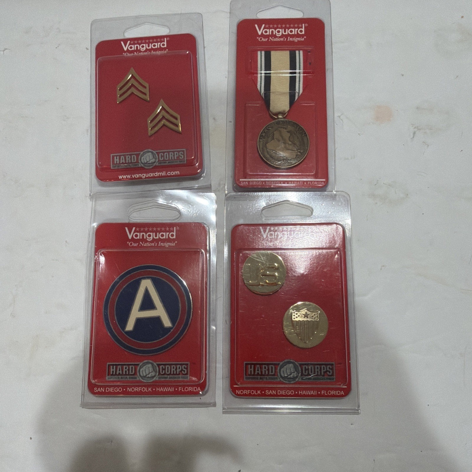 Lot Of 4 Vanguard US Army Metals Hard Corps