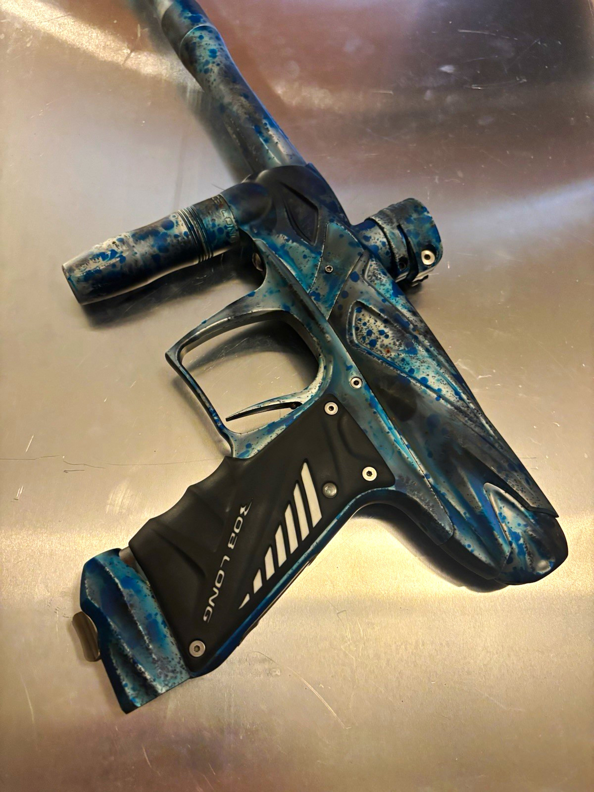 Bob Long onslaught Paintball Marker/ blue, and black splatter acid wash.