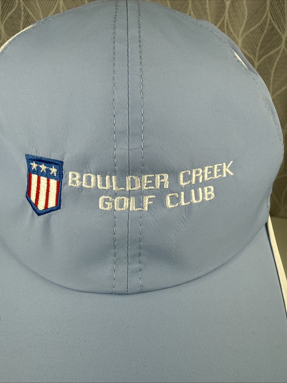 Boulder Creek Golf Club w RWB Logo on Greg Norman Perwinkle Hat Cap Hook Loop