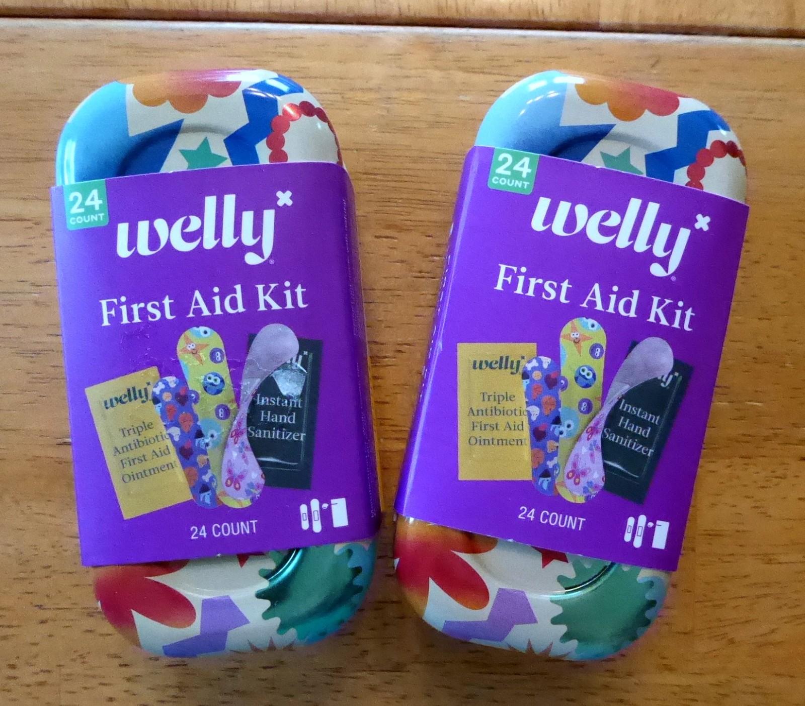 Welly ~ First Aid ~ 24ct. kit ~ bandages, ointment, sanitizer ~ sealed ~ fun tin