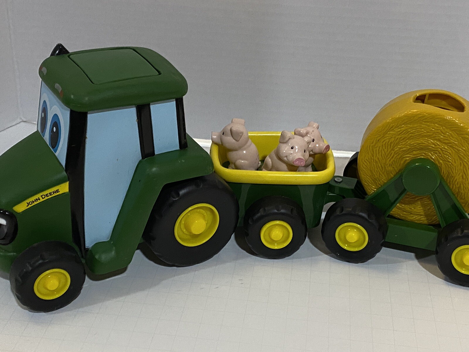John Deere Rubber & Plastic Three Pc Tractor Set. Push Button & Music Plays
