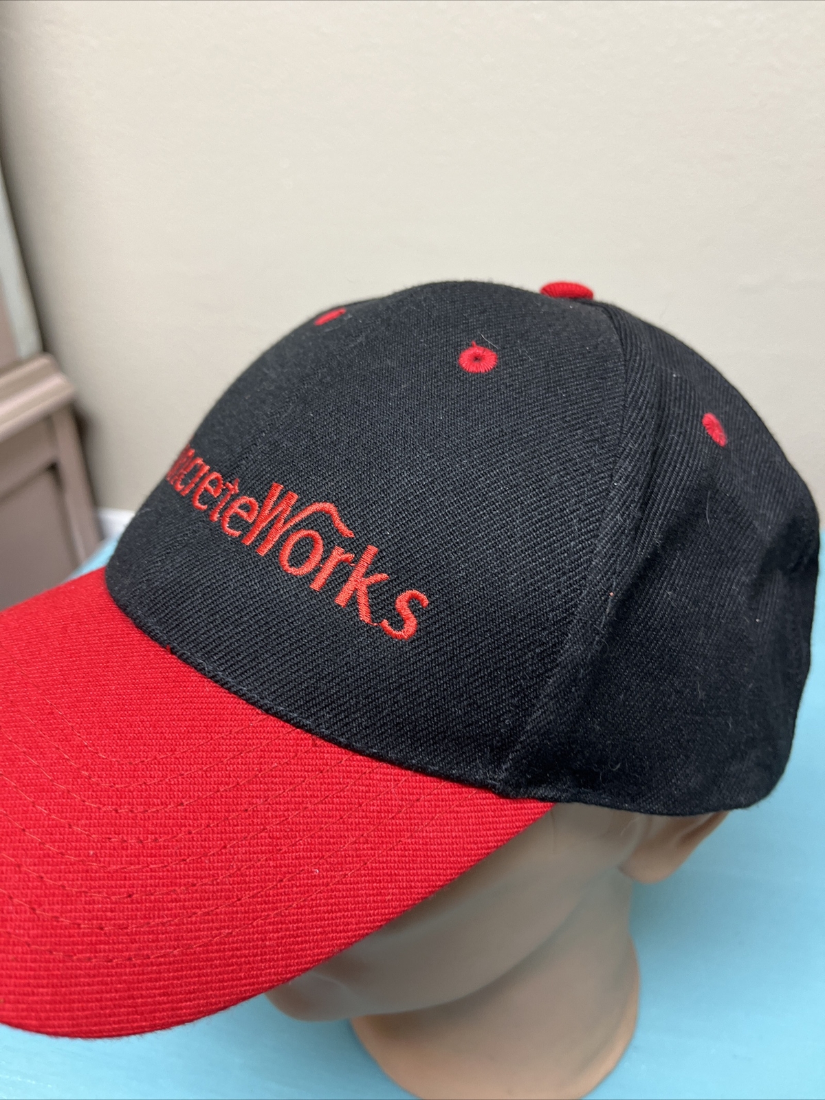 RED/BLACK CAP EMBROIDERED LOGO CONCRETE WORKS ON STRAPBACK HAT