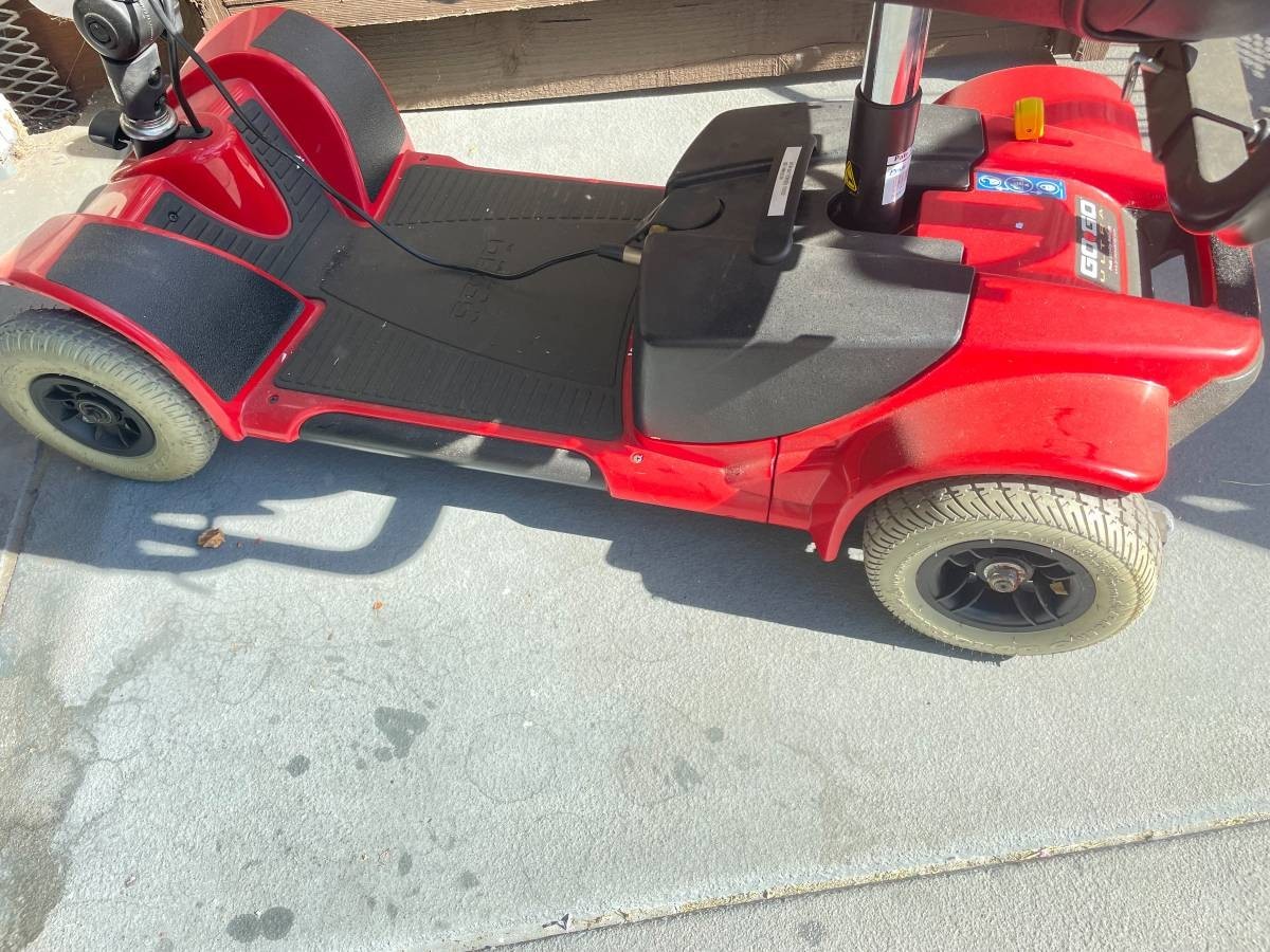 MOBILITY 4 WHEEL SCOOTER ,RED GO GO ULTRA