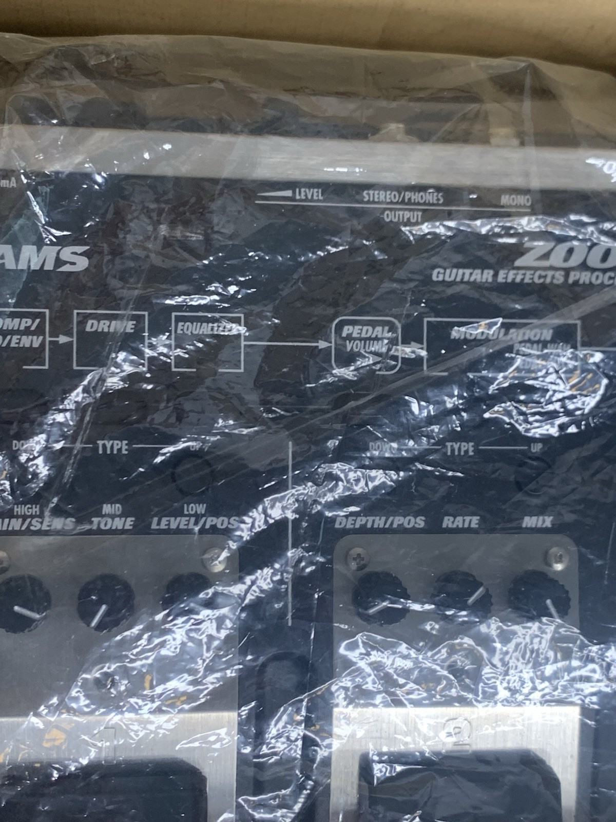 Zoom GFX-4 guitar effects processor packaged in its original white Box