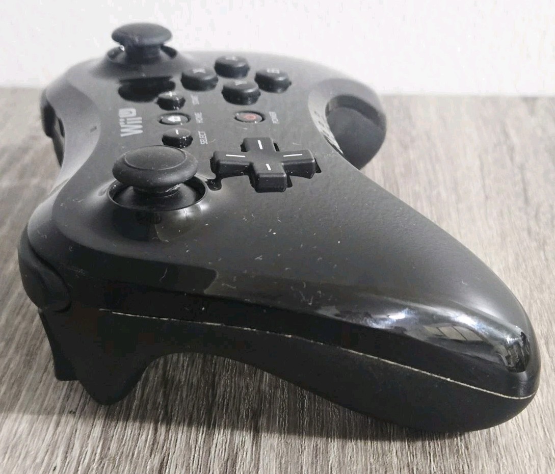 Official OEM Nintendo Wii U Black Wireless Pro Controller Used.
