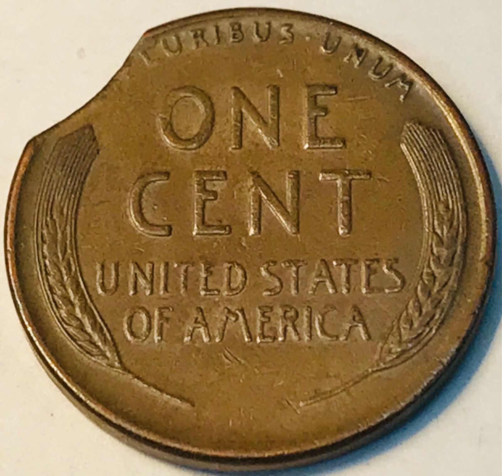1944 Lincoln Wheat cent with curved clip
