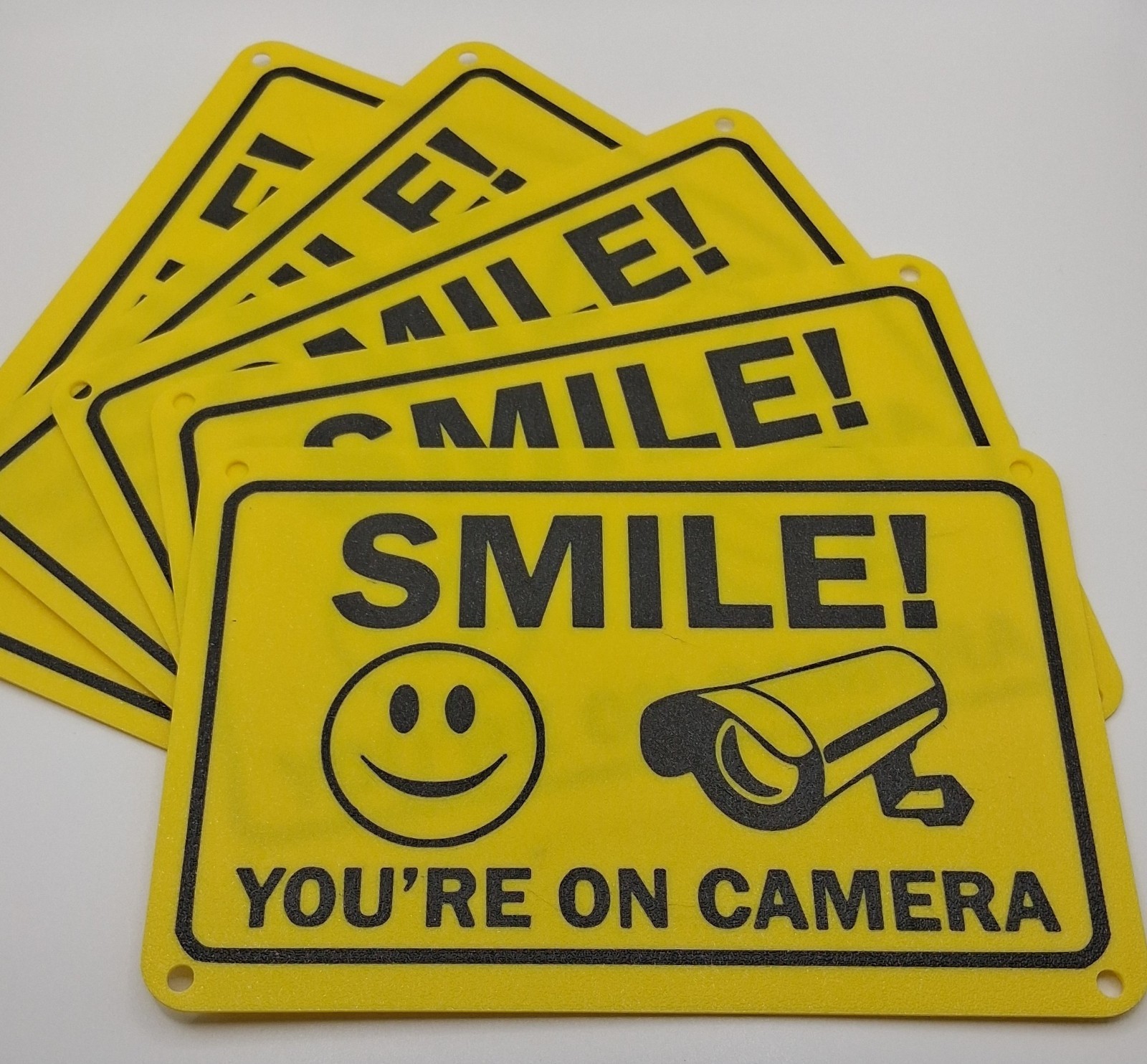 5 pack - Smile You're on Camera Signs 6"x9" Plastic