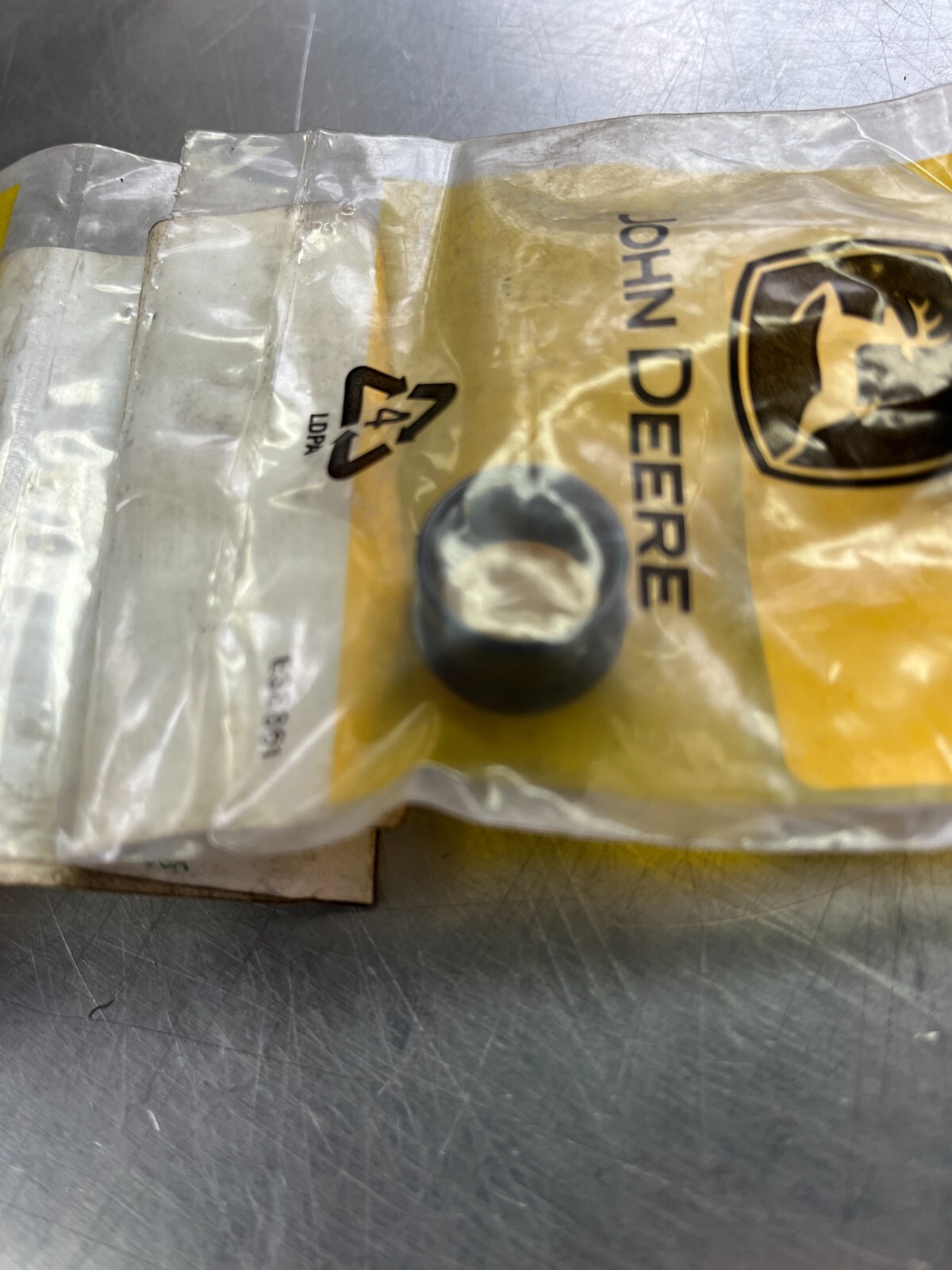 R42093 Genuine OEM John Deere GROMMET
