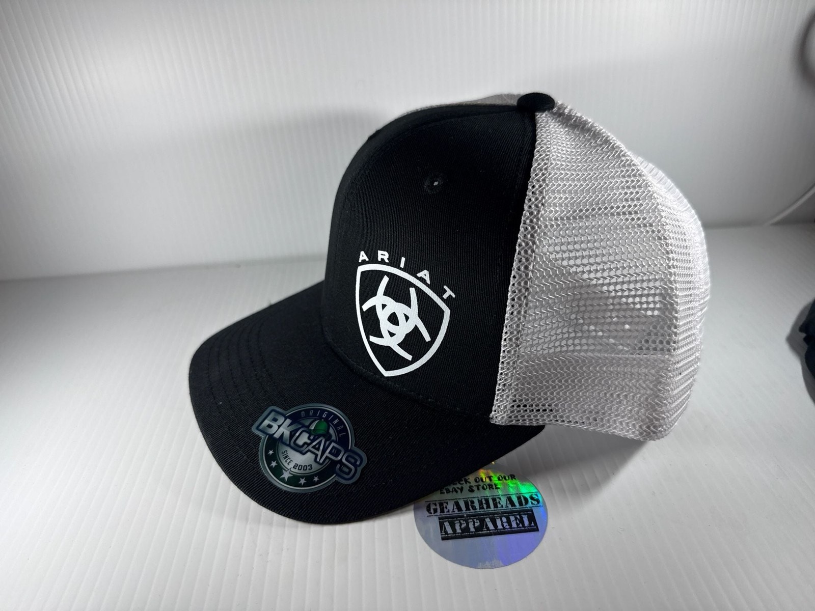 BKCaps 112 Ariat White Shield Logo Black Mesh Back Trucker Hat
