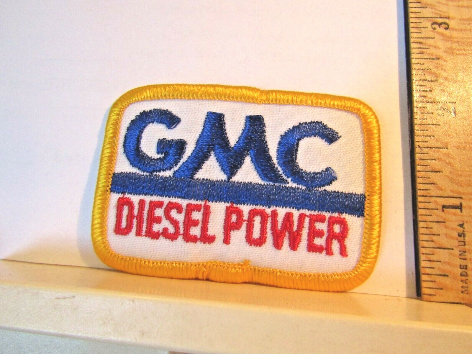New Old Stock Embroidered GMC Diesel Power patch gold edge blue GMC 3x2"