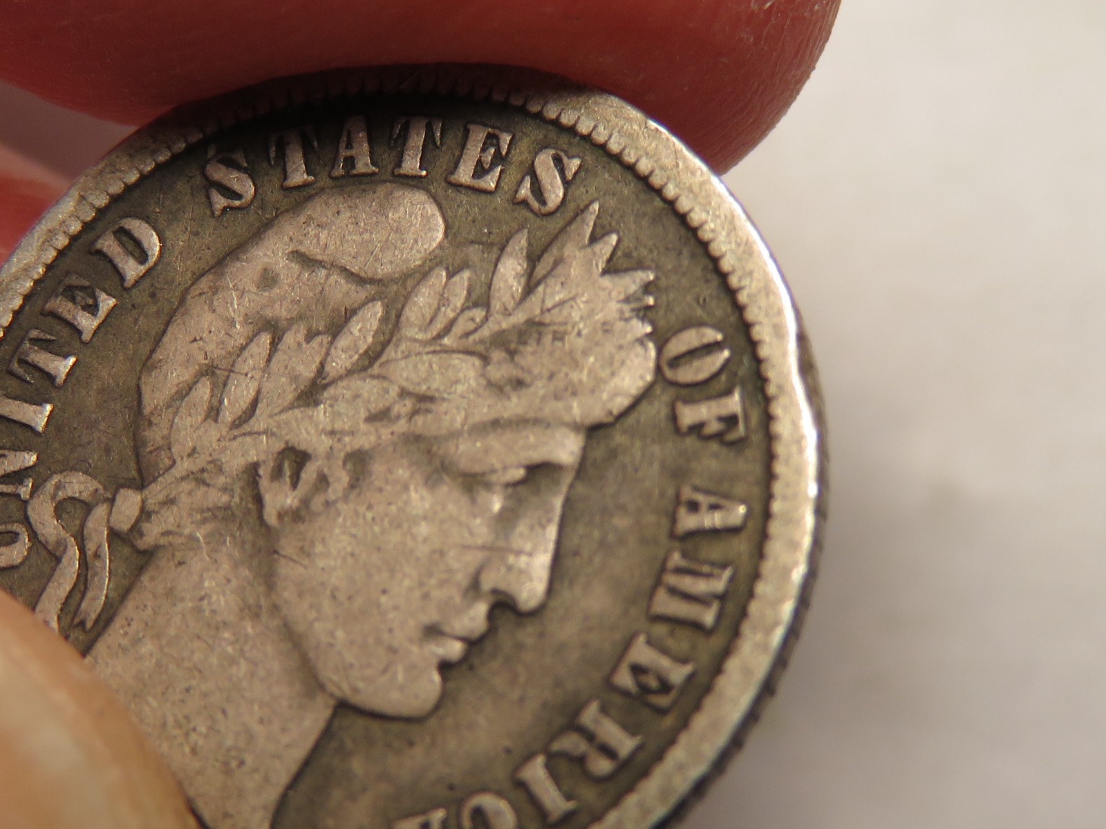 1899-O Barber Dime, Fine, Small Rim Ding