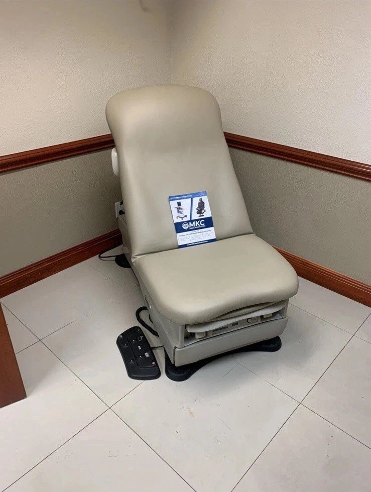 Midmark 625 Exam Table with new any color upholstery.