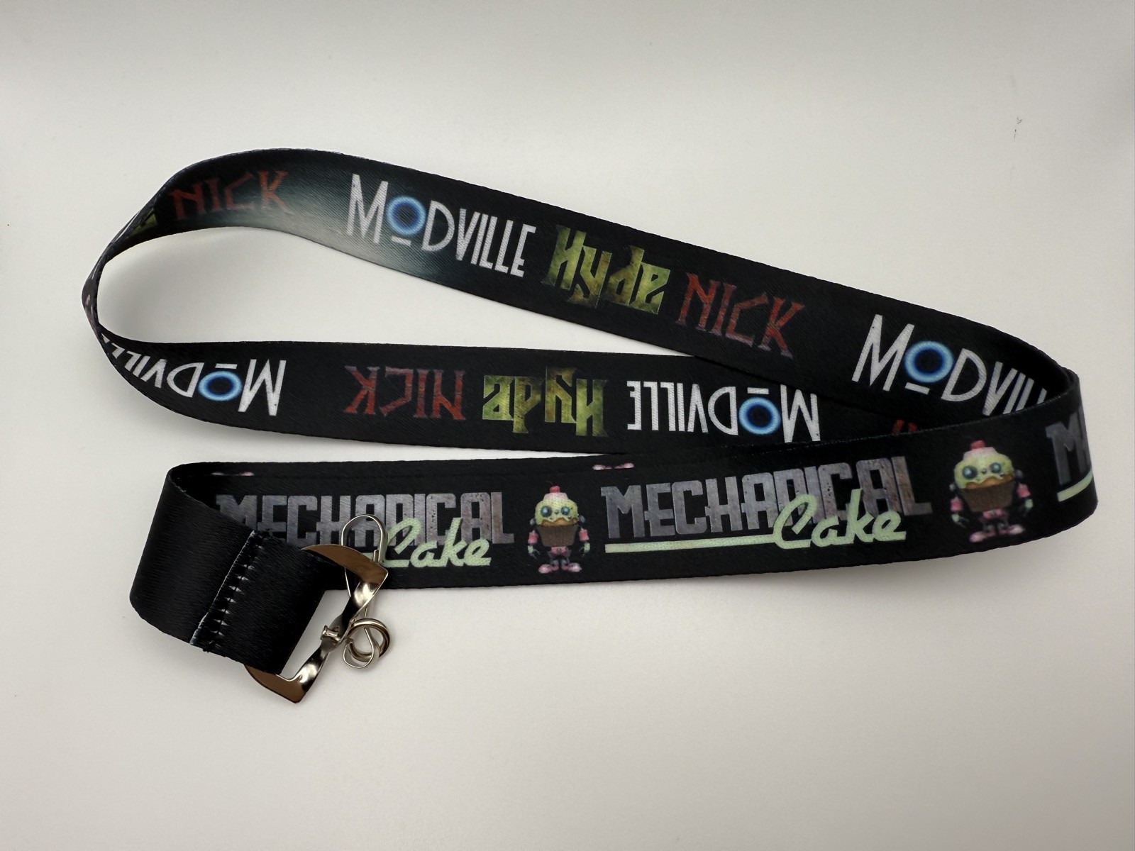 SDCC 2025 EXCLUSIVE Mechanical Cake / Modville Hyde Nick Promo Lanyard