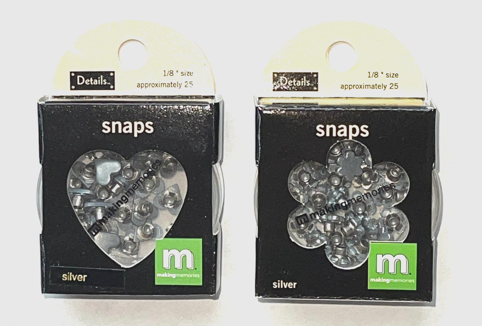 TWO NIP PACKAGES OF MAKING MEMORIES 1/8" HEARTS AND FLOWERS SNAPS W/ STORAGE