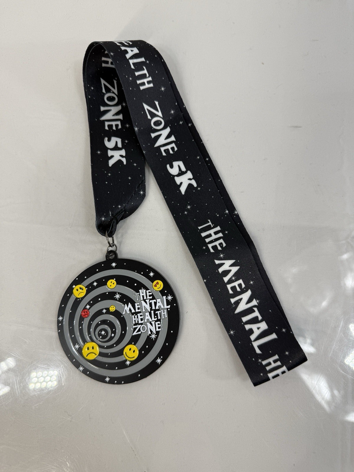 The Mental Health Zone 5K Finishers Medal Race Smile Happy Face Swirl