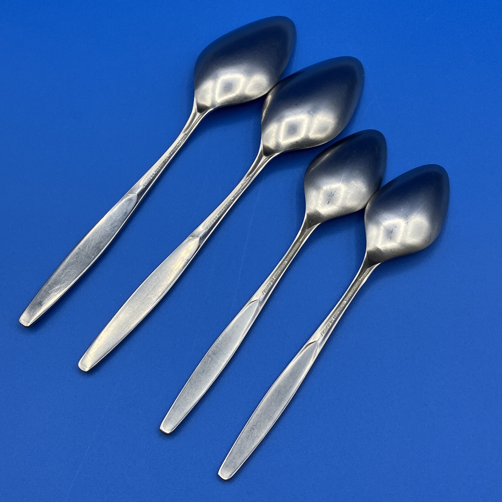 (4)International Deluxe SATURNA Satin Stainless SPOONS Burnished Handle Flatware