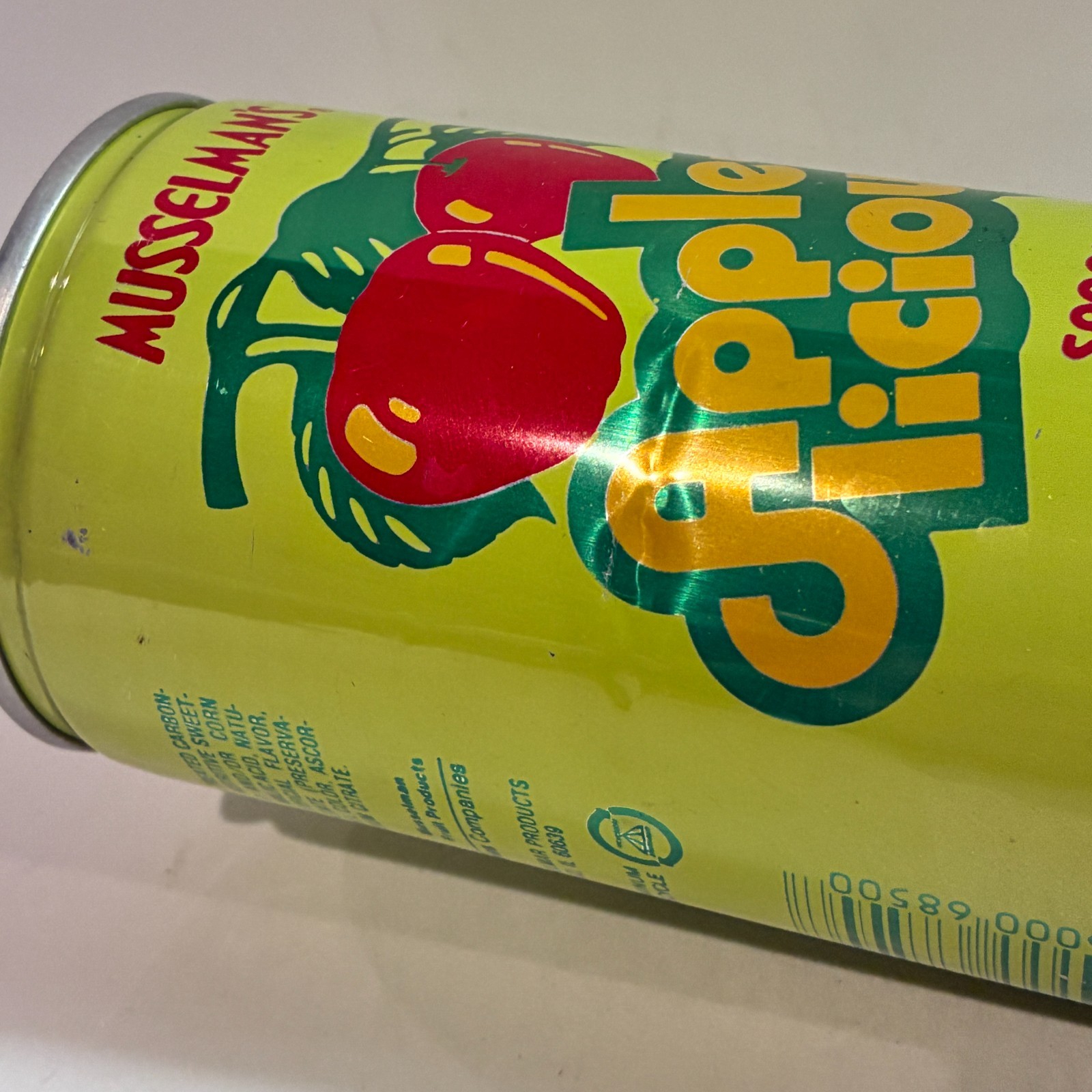Musselman's Apple-licious Apple soda can, bottom opened