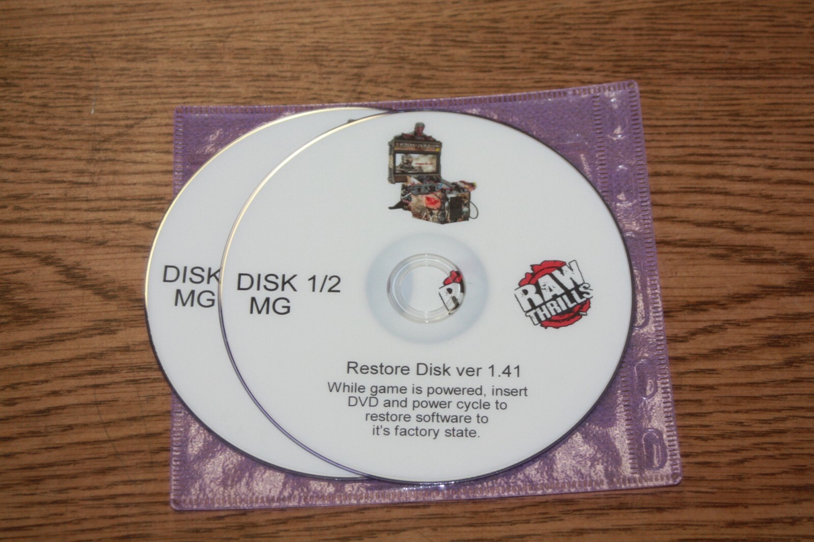 USED FIXED GUNS TERMINATOR SALVATION RAW THRILLS RECOVERY DVD DISK SET