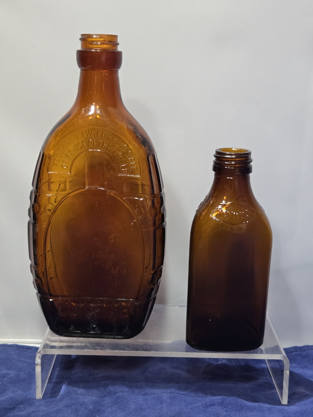 Vintage Calvert Whiskey Bottle & Norwich Triangle Bottle Amber Glass Lot of 2