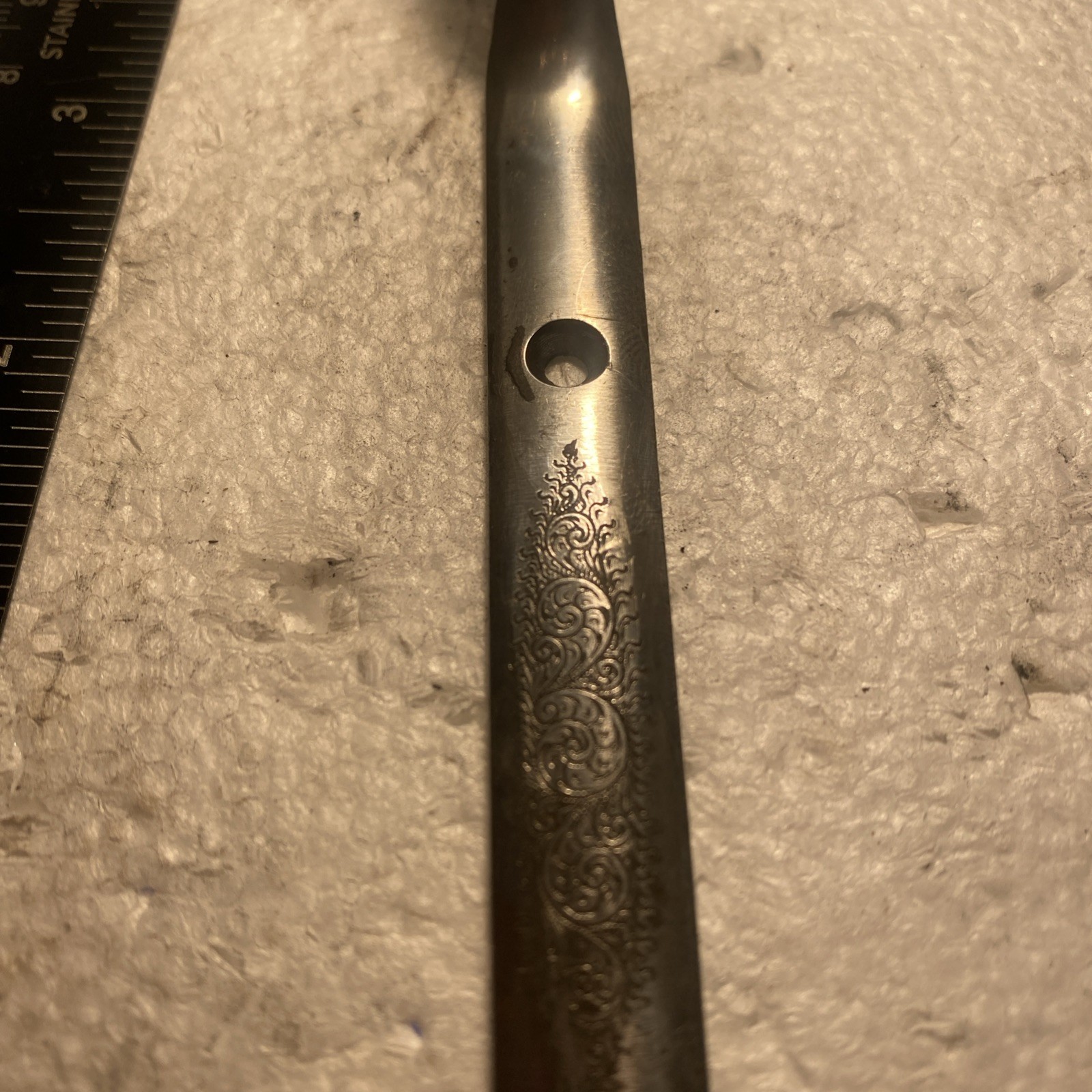 Silver Trigger Guard Of Unknown Brand.