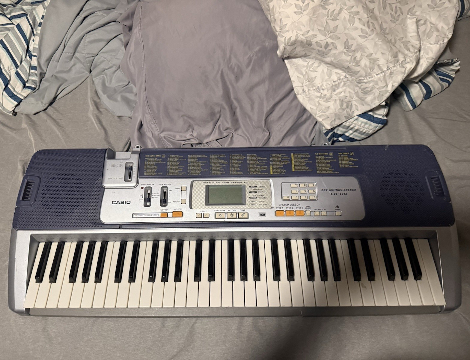 Casio LK-110 61-Key Lighting Keyboard w/ LCD & Built-in Speaker Blue/Silver