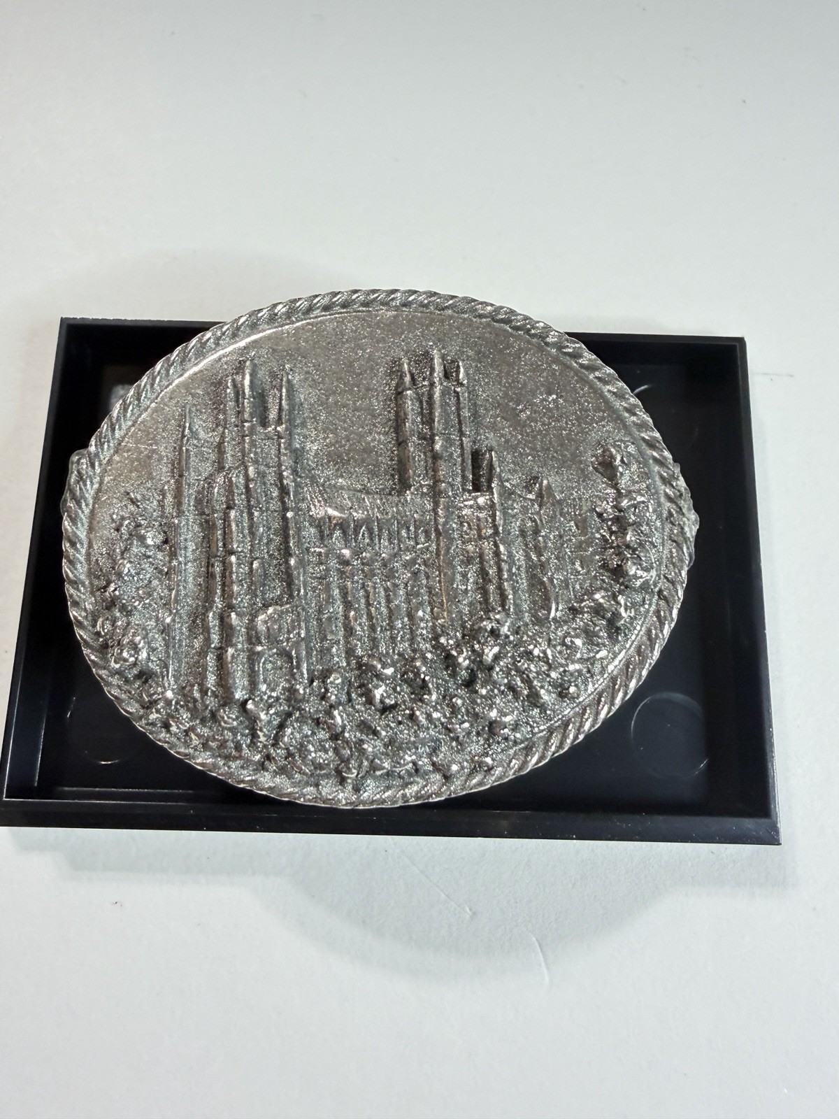 Small metal box with embossed image of Canterbury Cathedral