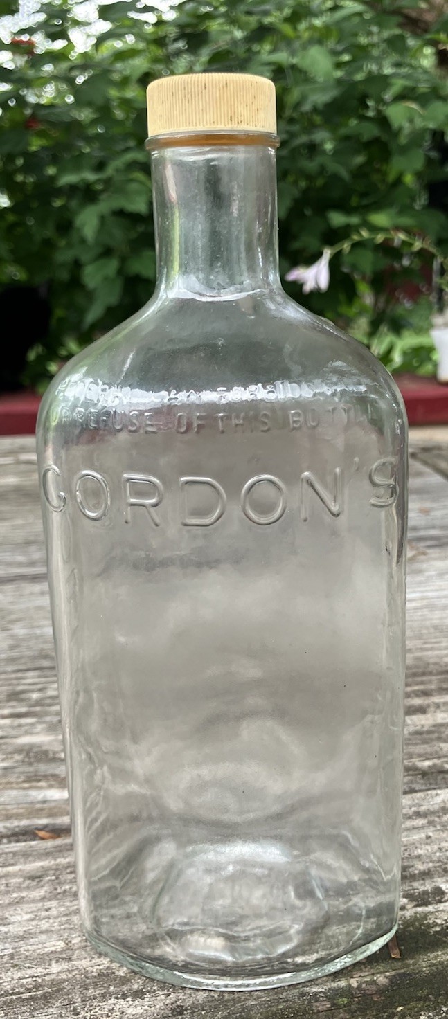 Gordon’s Gin Bottle. 1969. Boars Head Emblem on Bottom.  Embossed