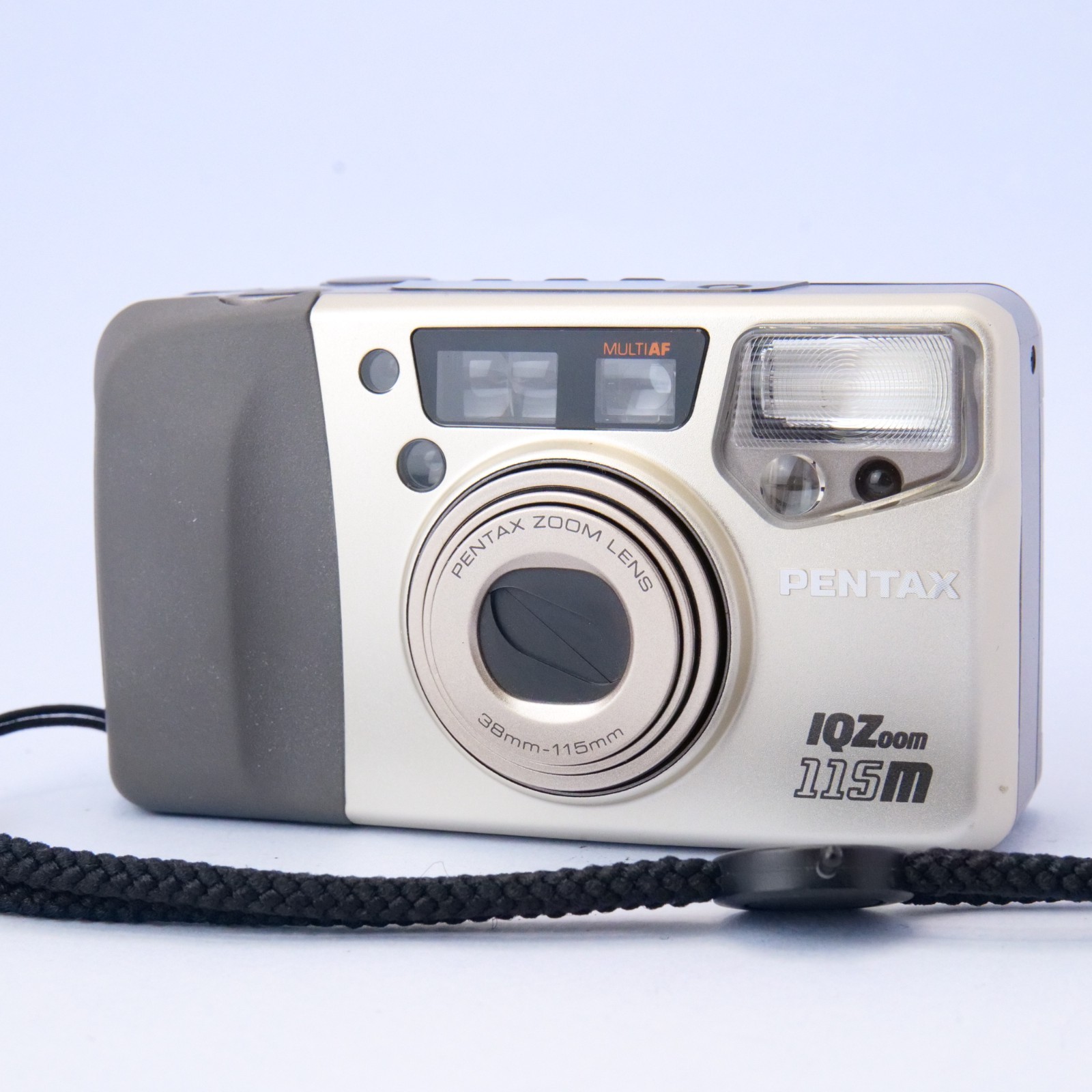 Pentax IQZoom 115M 35mm Film Camera 38-115mm Lens Working Missing Battery Door