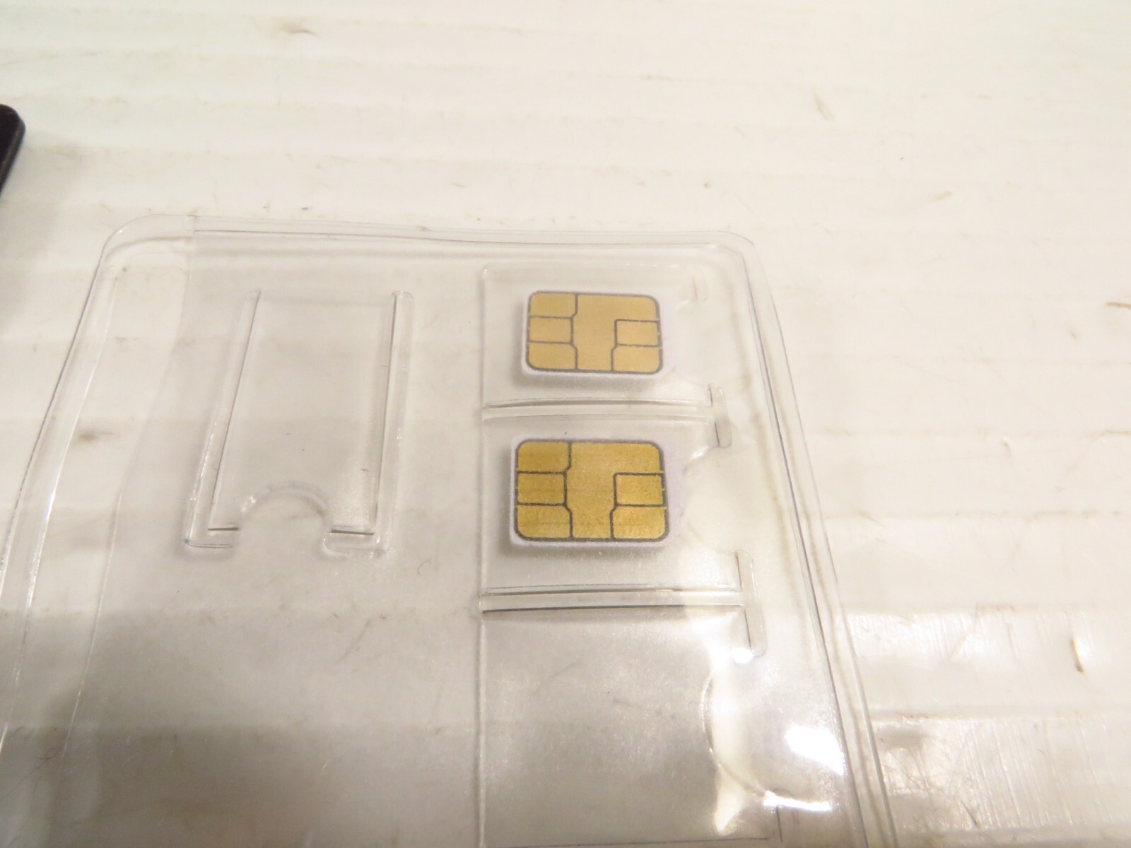 Universal Sim Card Adapter w/ 2 Vodafone Sim Card (Unknown Regine)