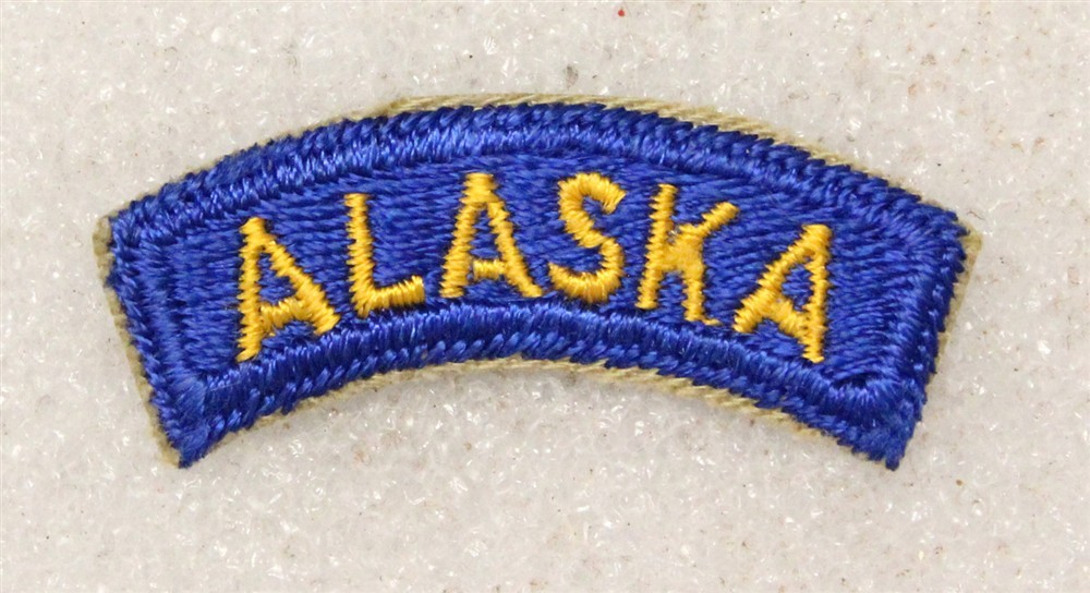 Army patch 5040: "ALASKA" tab - small, yellow on blue w/cut edge