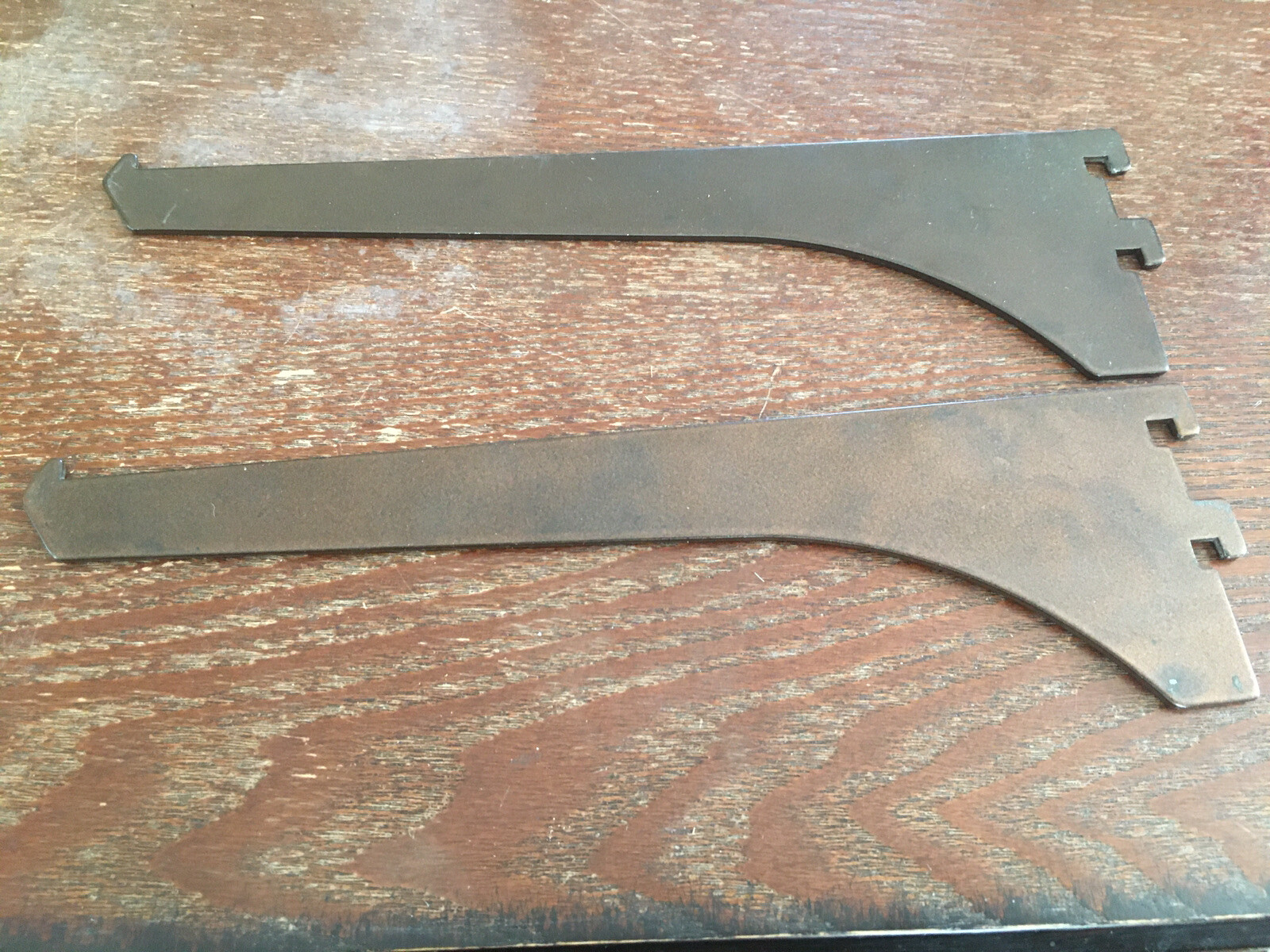 2 brown metal shelf support arms 8" after Slotted.