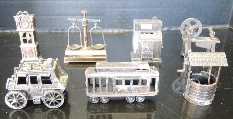 Seven Vintage Metal Figural Pencil Sharpeners