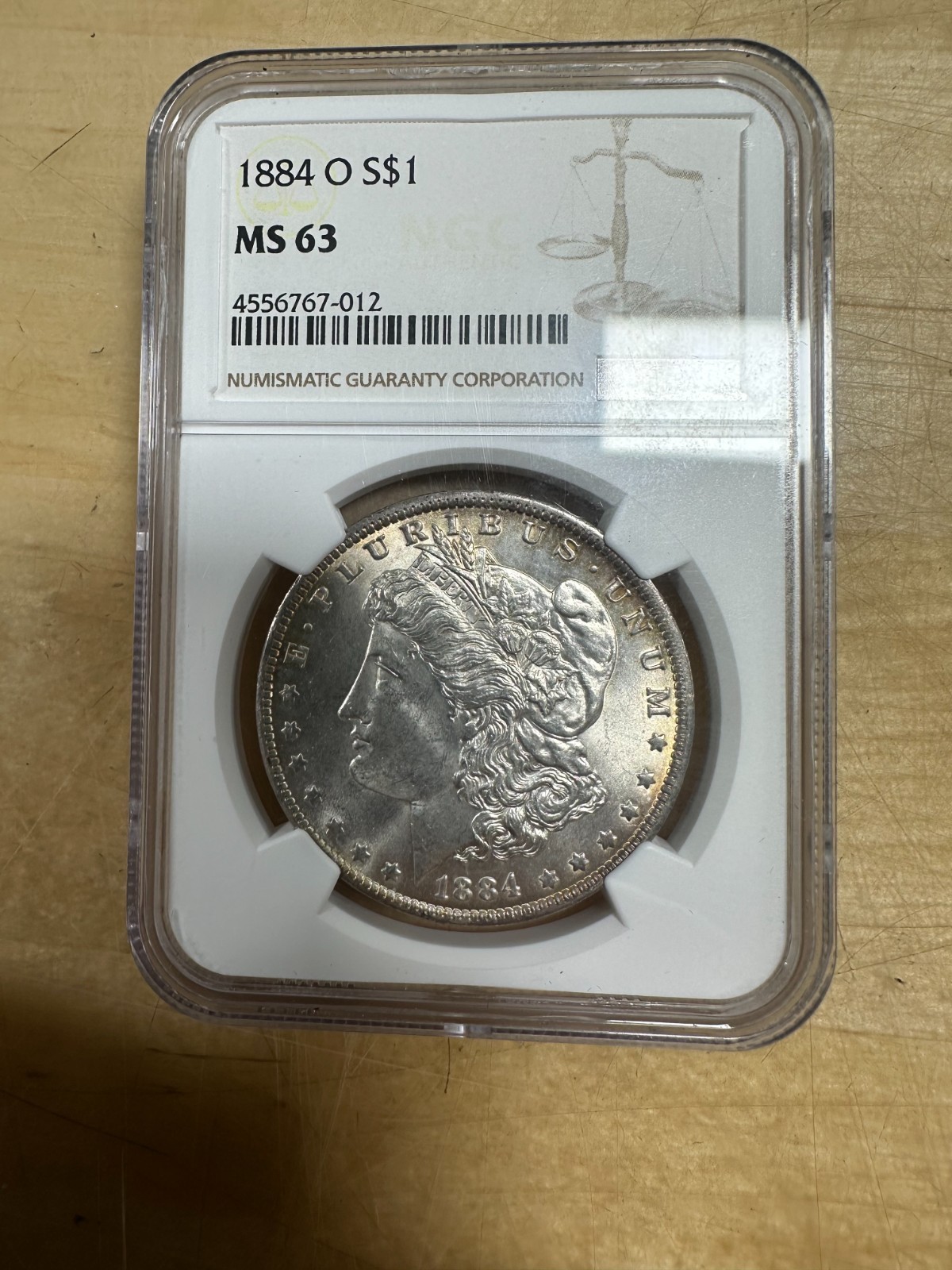 1884-O Morgan Silver Dollar MS63 NGC Toning