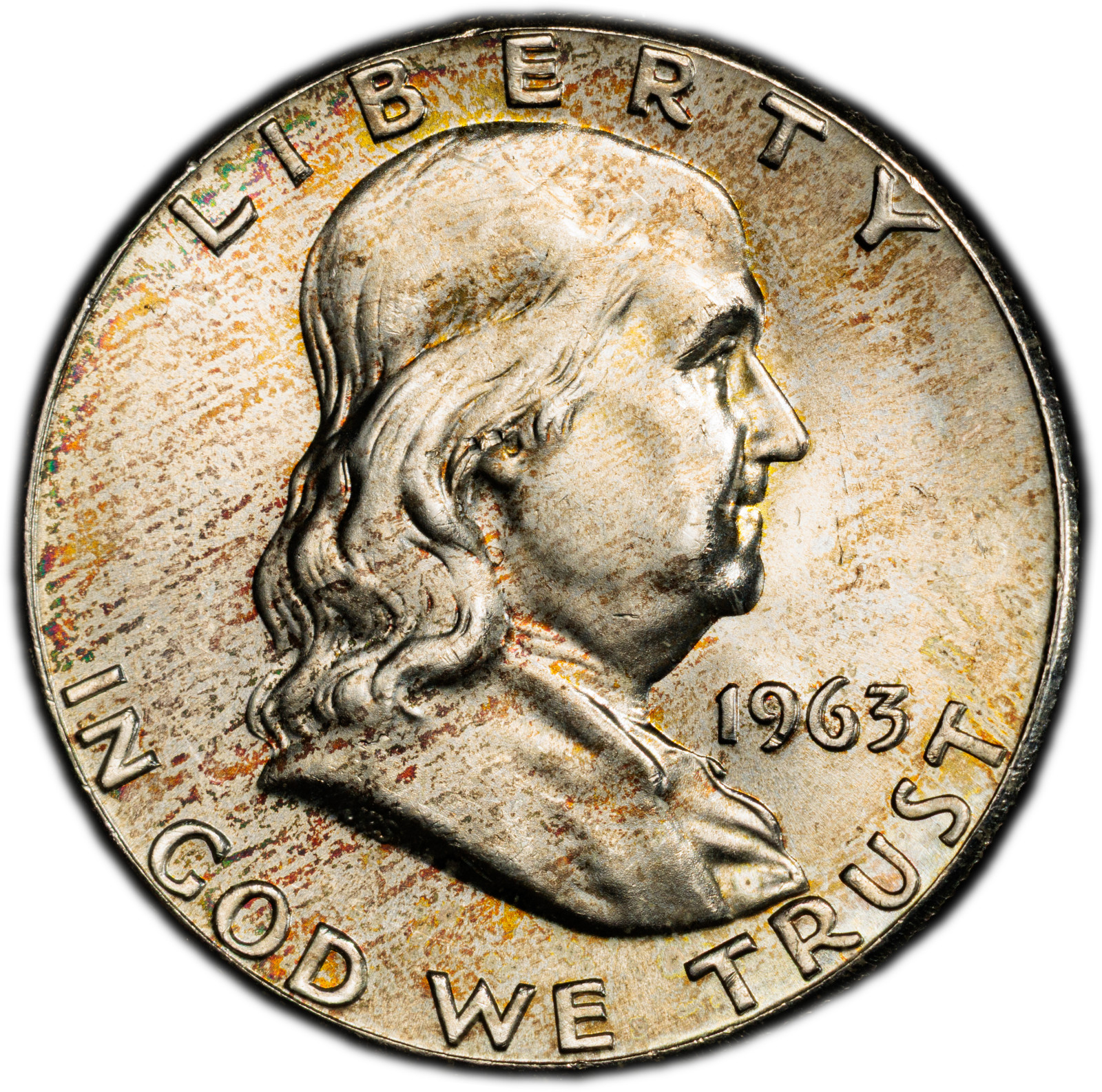1963-P PCGS Genuine UNC Details Franklin Half Dollar w/ Rainbow Streak Toning