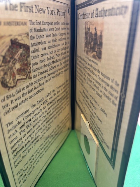 The First New York Penny in a Leather Binder with COA