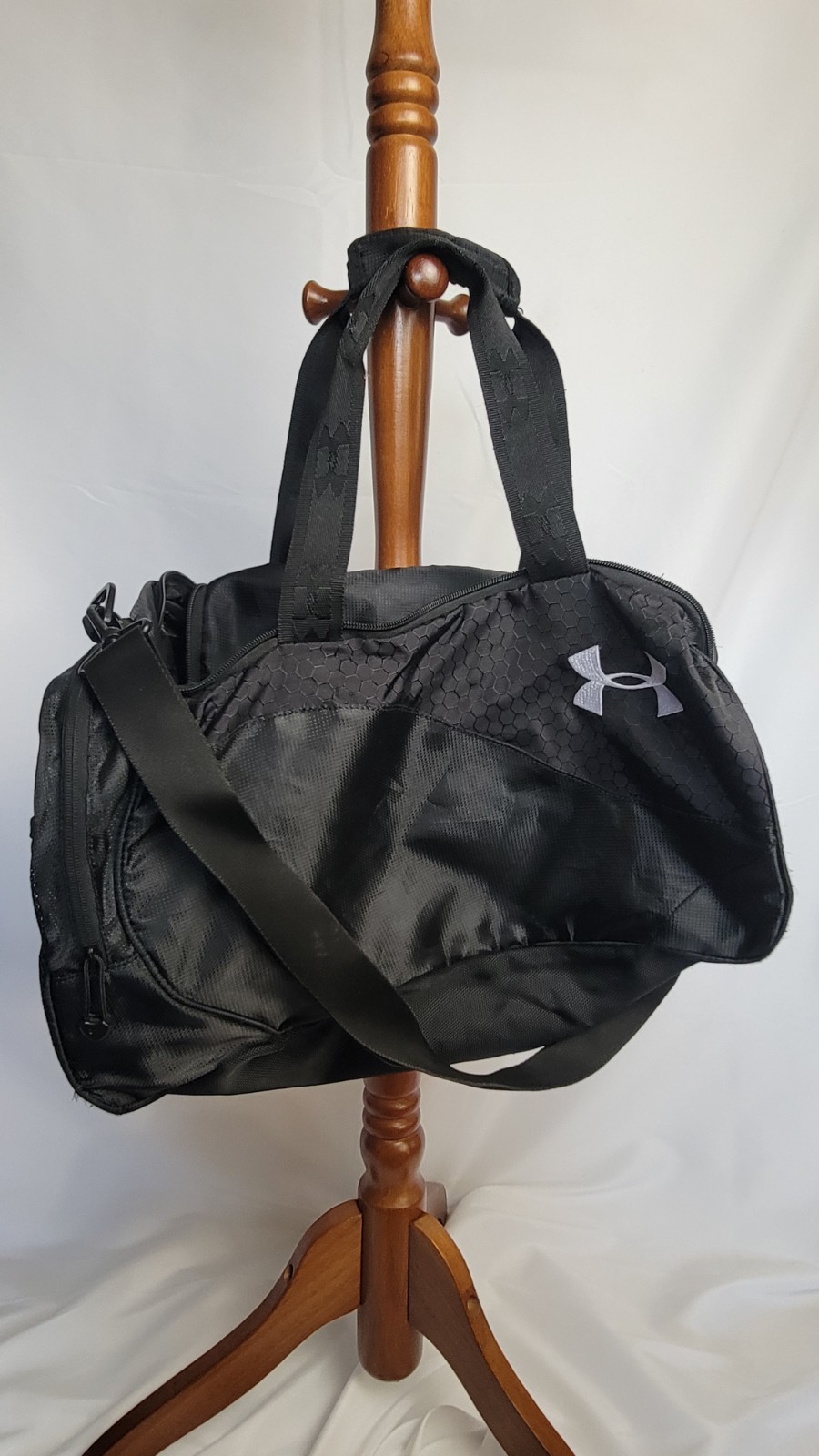 Under Armour duffel bag in black.