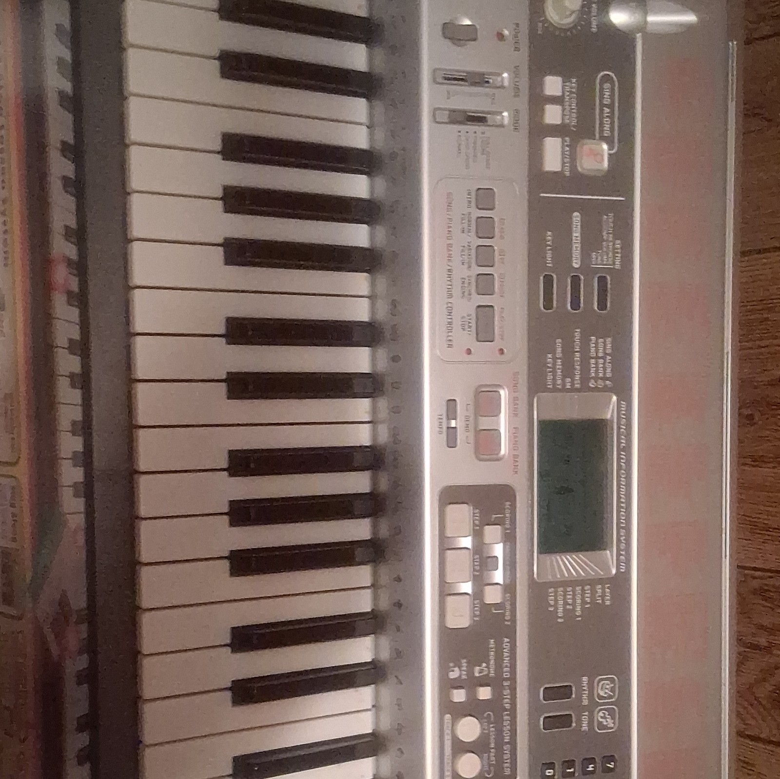 Casio LK-55 61-Key Key Lighting Electronic Keyboard Silver w/ Microphone