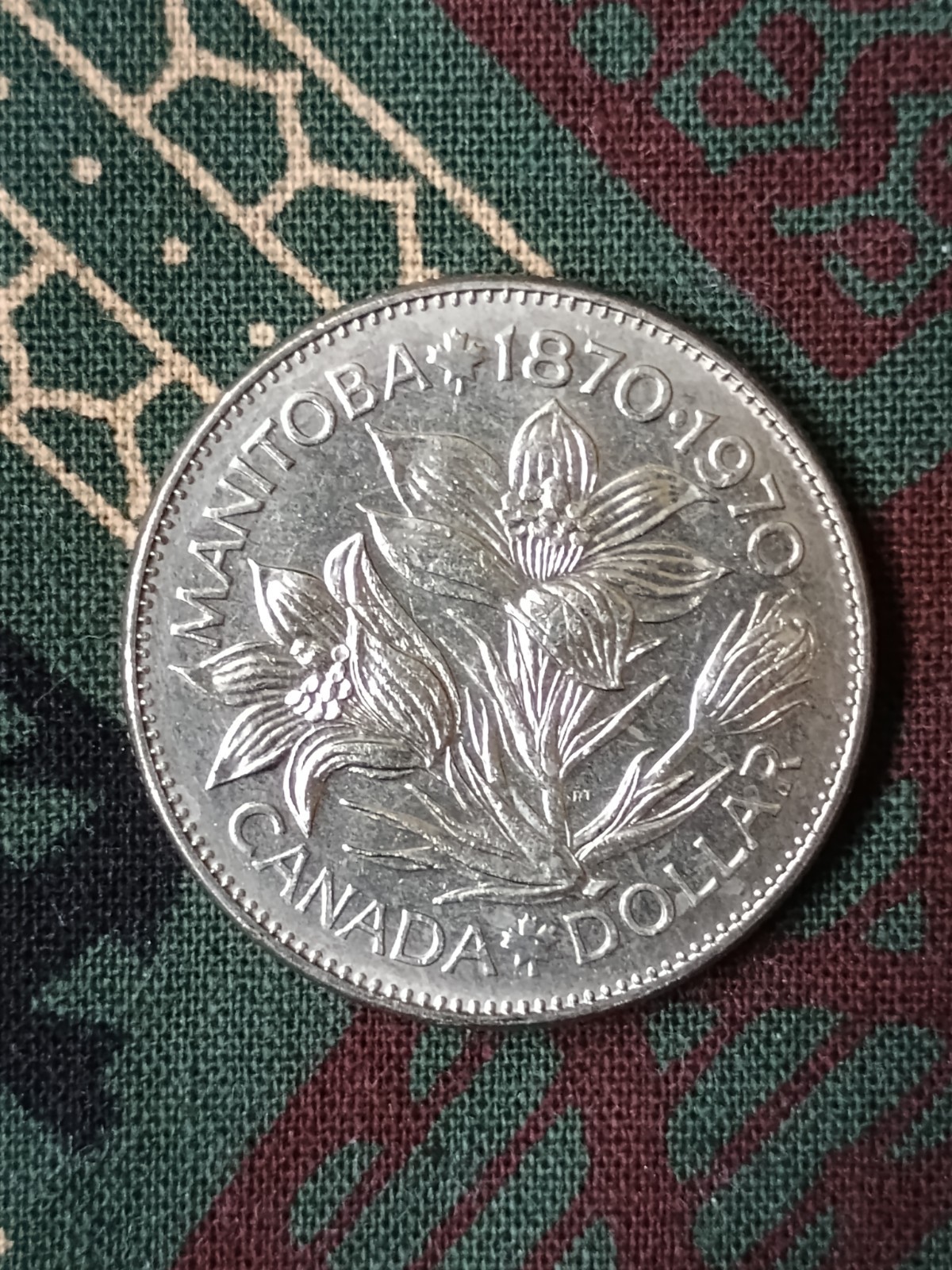 1970 Canada Dollar Manitoba Commemorative Uncirculated (haze,contact marks)